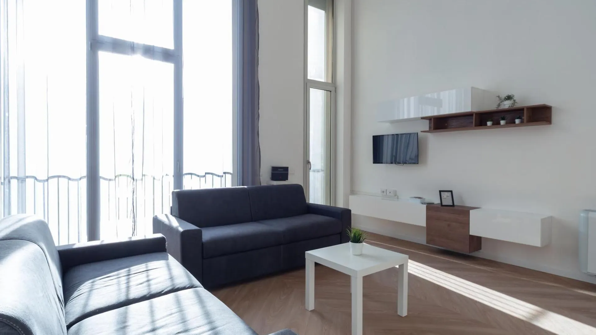アパート Loft Bicocca Comfort Suite ミラノ